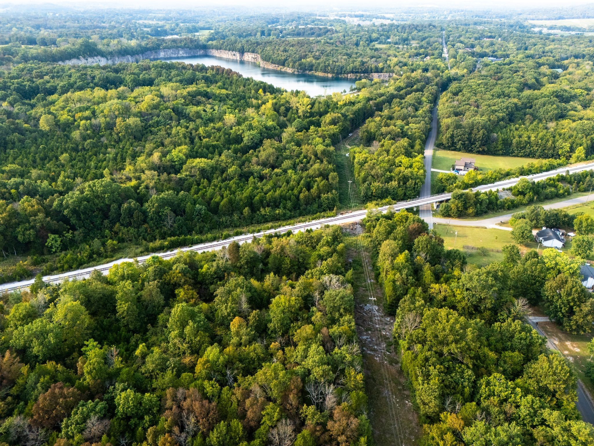 1054 Quarry Road Mount Juliet, TN 37122 - Photo 3 of 20 an aerial view of residential houses with outdoor space and trees