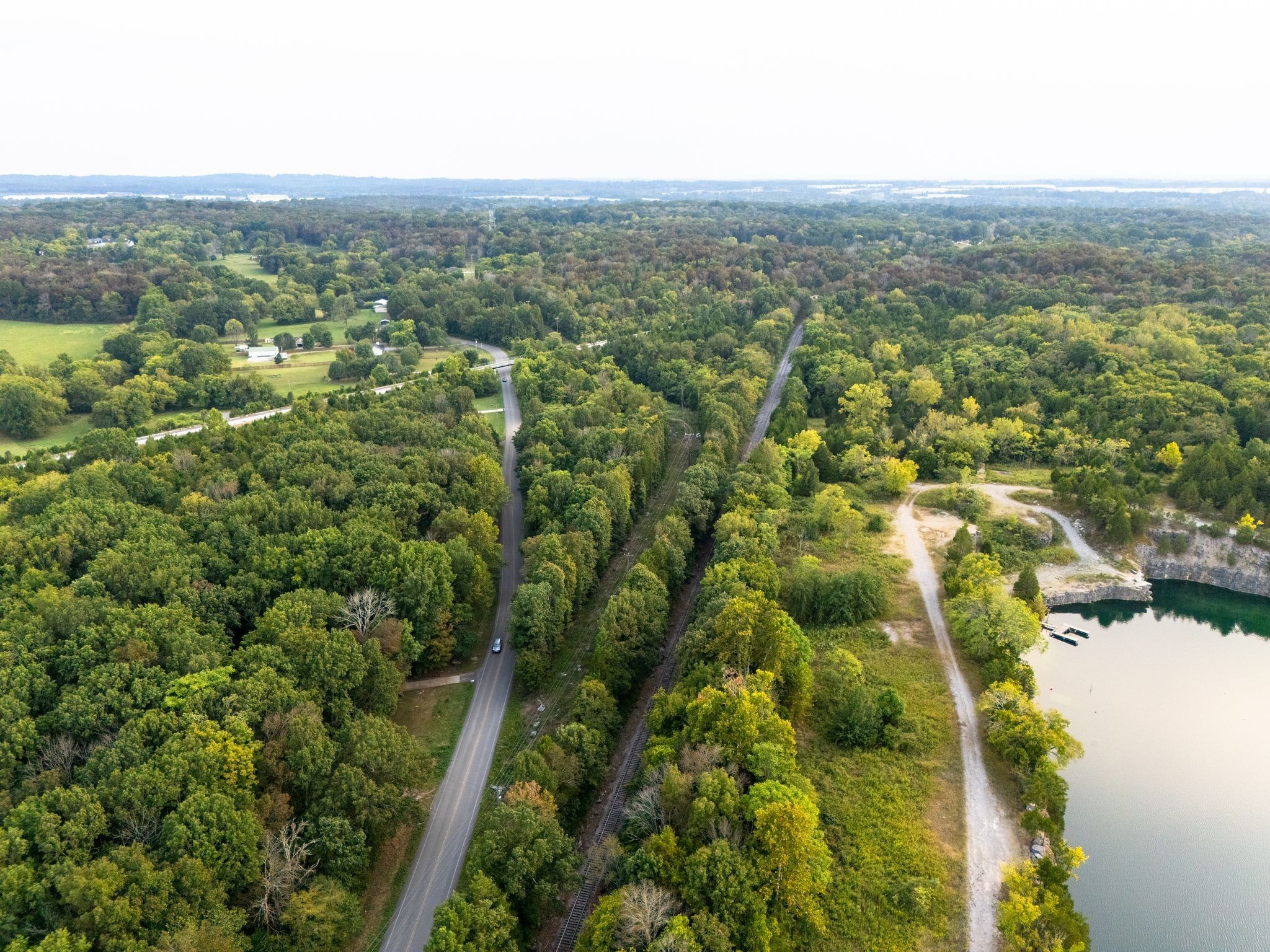 1054 Quarry Road Mount Juliet, TN 37122 - Photo 9 of 20 an aerial view of residential houses with outdoor space and trees