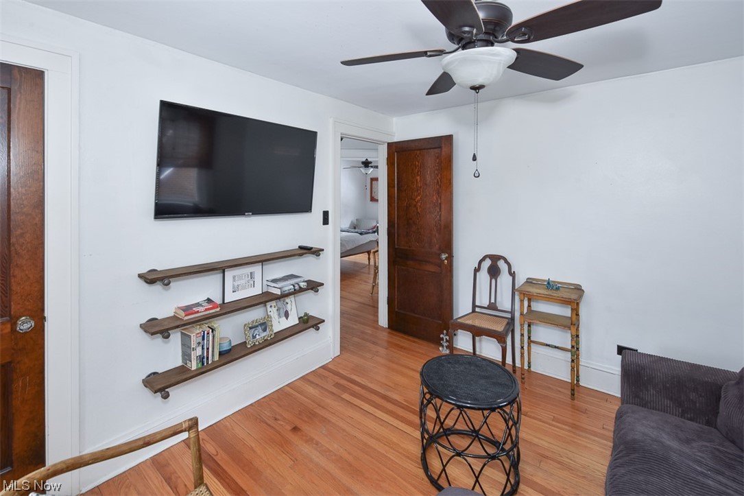 925 Beverly Road Cleveland Heights, OH 44121 - Photo 18 of 25 Living room with light hardwood / wood-style flooring and ceiling fan