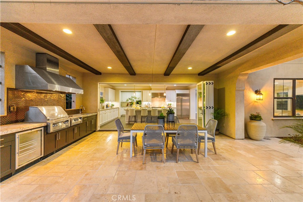 71 Clocktower Irvine, CA 92620 - Photo 49 of 73 Covered California room with a fully equipped built-in outdoor kitchen