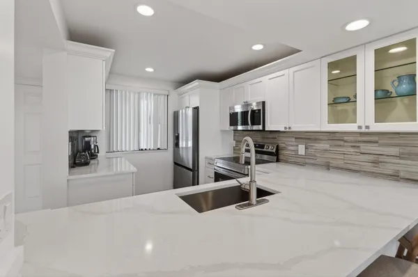 $8,500 | 301 South Seas Drive, Unit 104, Jupiter, FL 33477