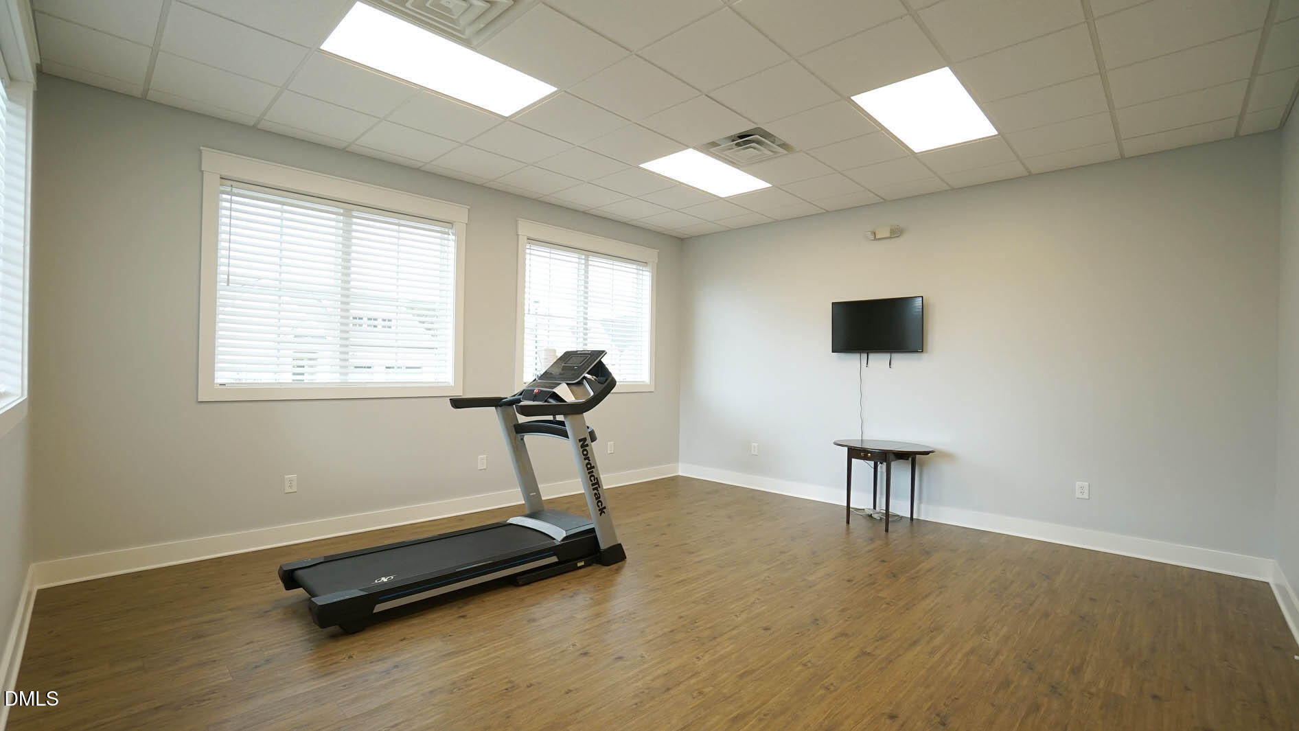 693 South Wilma Street Angier, NC 27501 - Photo 45 of 51 a view of a room with gym equipment and a window
