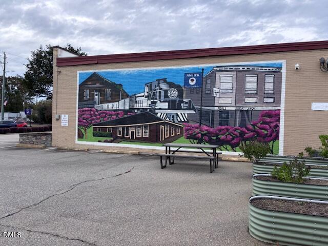 693 South Wilma Street Angier, NC 27501 - Photo 51 of 51 a sign board with a parking space