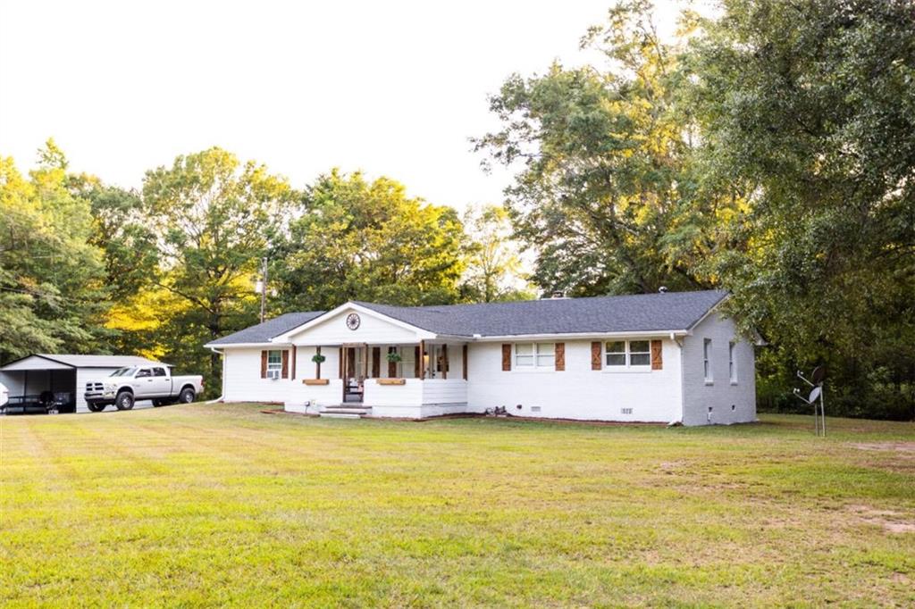 a swimming pool with buildings in the background