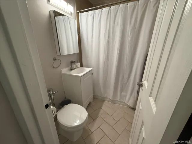 a bathroom with a sink and a toilet