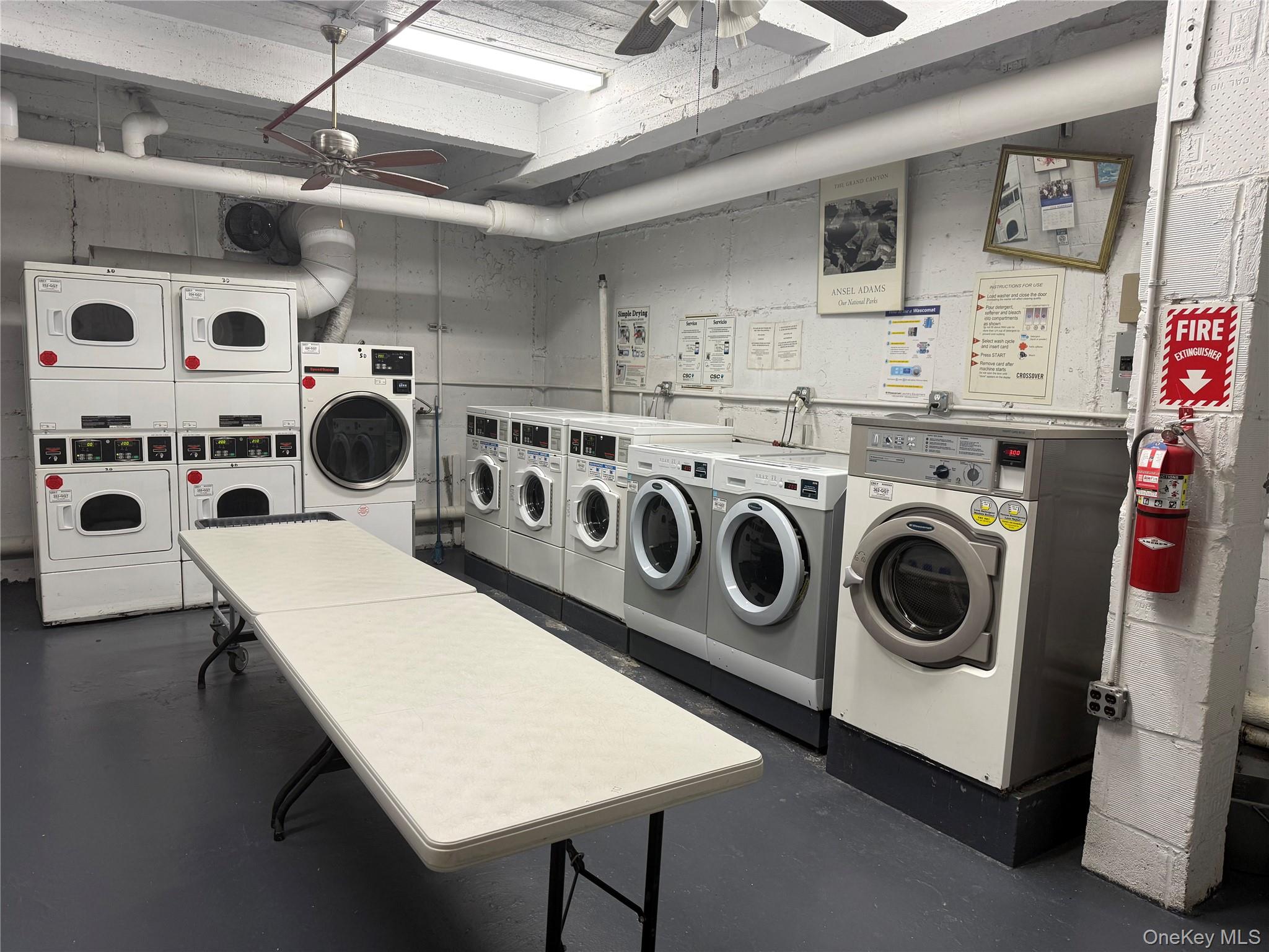 3123 Bailey Avenue, Unit 3A Bronx, NY 10463 - Photo 16 of 17 a utility room with dryer and washer