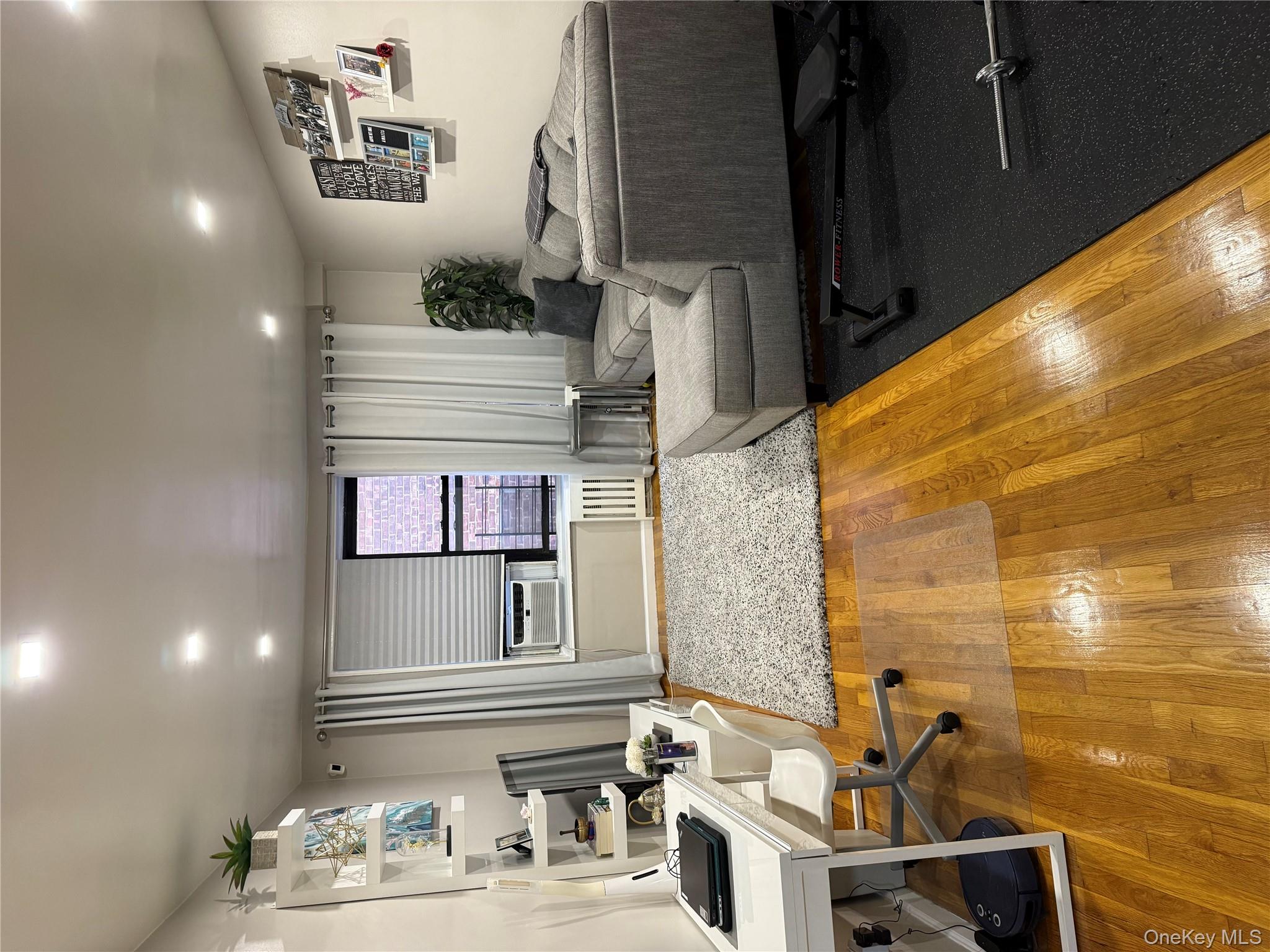 3123 Bailey Avenue, Unit 3A Bronx, NY 10463 - Photo 3 of 17 a living room with furniture pool table and kitchen view