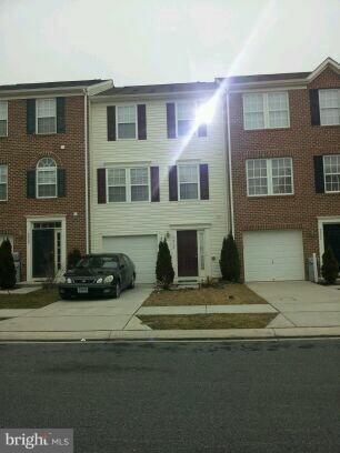 9862 Decatur Road Middle River, MD 21220 - Photo 4 of 4 a view of building with car parked