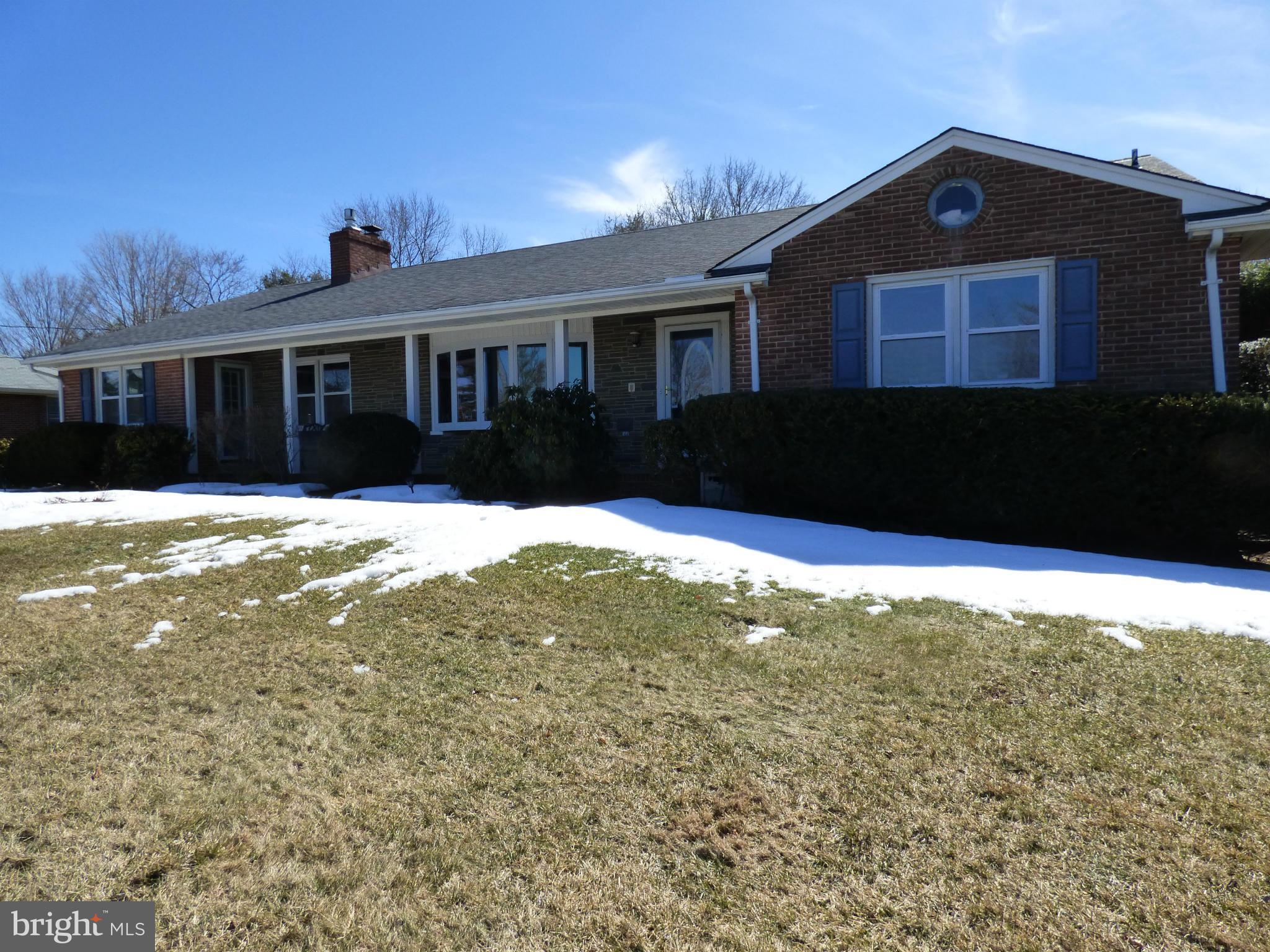 9228 Gue Road Damascus, MD 20872 - Photo 2 of 30 a front view of a house with a yard