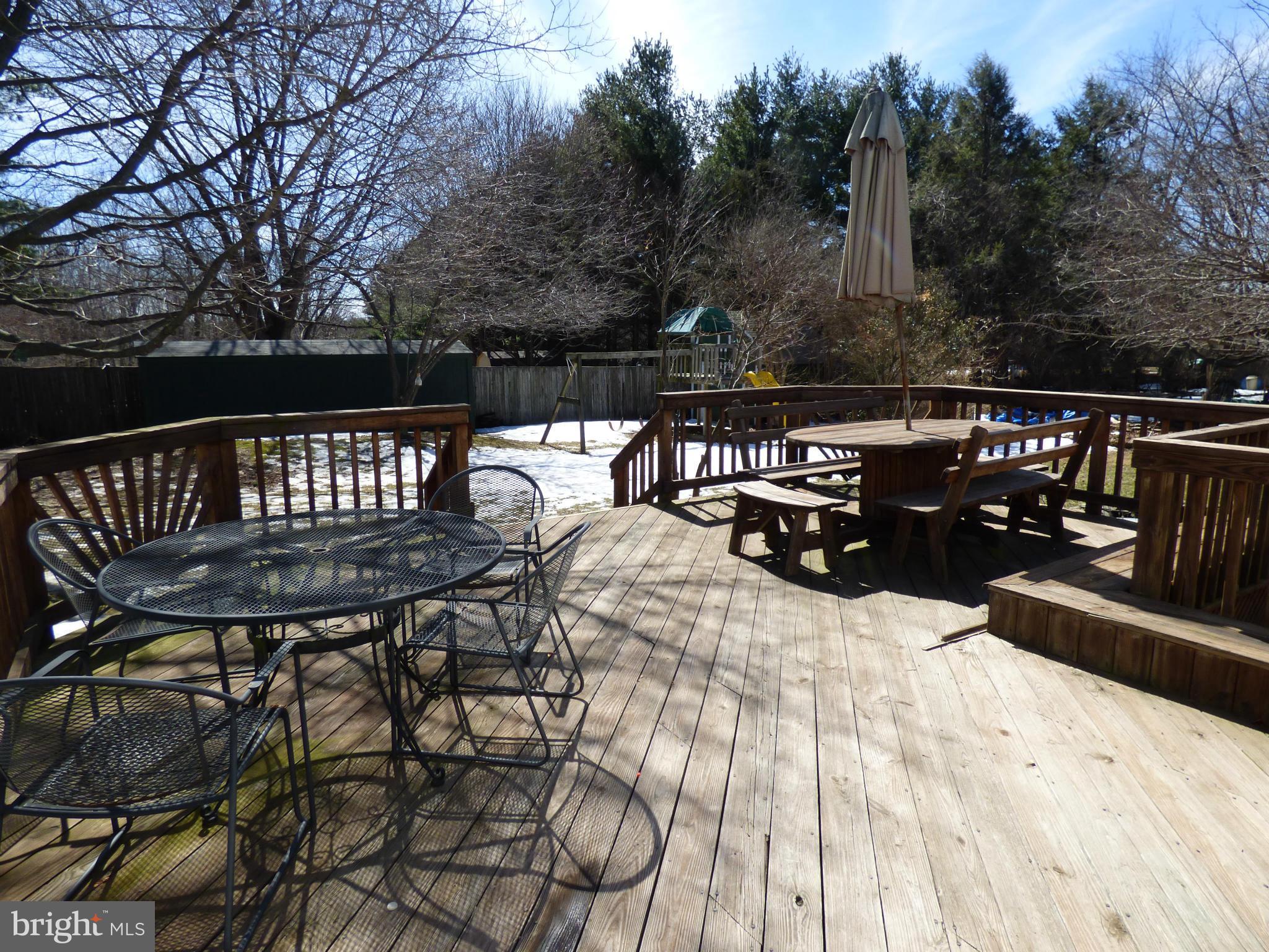 9228 Gue Road Damascus, MD 20872 - Photo 28 of 30 a view of a chairs and table on the deck