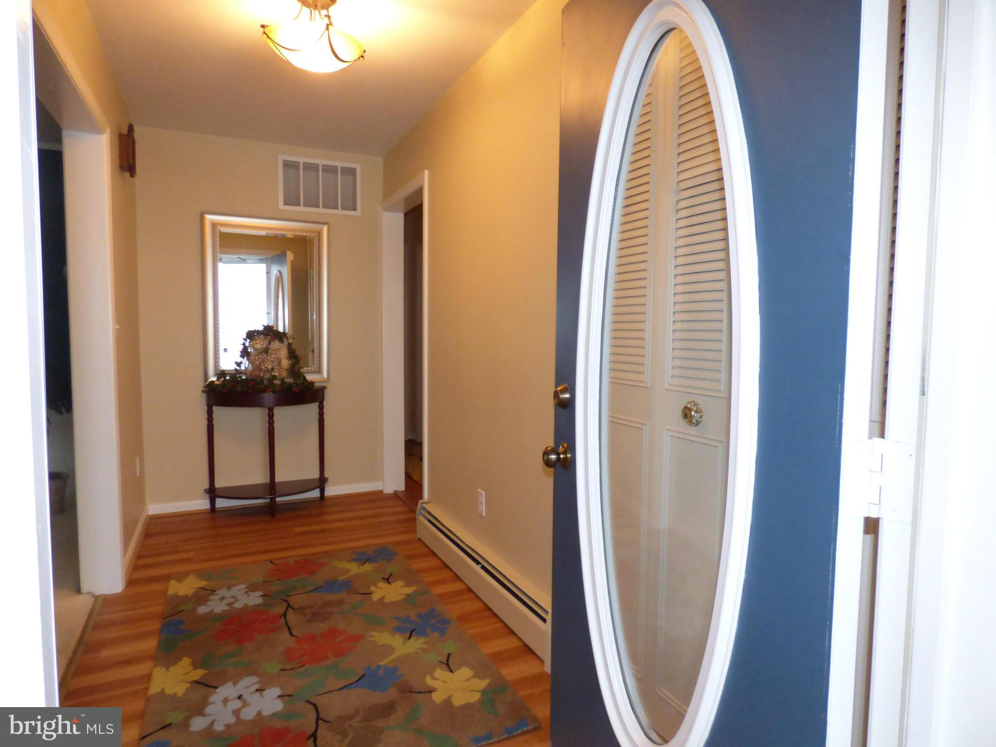 9228 Gue Road Damascus, MD 20872 - Photo 5 of 30 a view of a hallway with a elevator