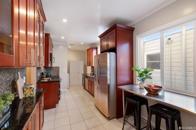 a view of kitchen with washer and dryer