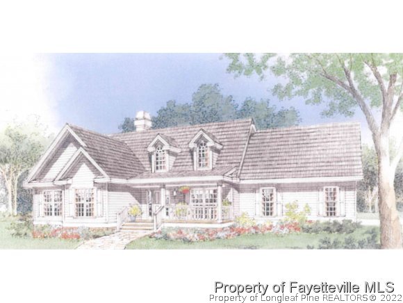 6776 Maxwell Road Stedman, NC 28391 - Photo 1 of 4 a front view of a house with a yard