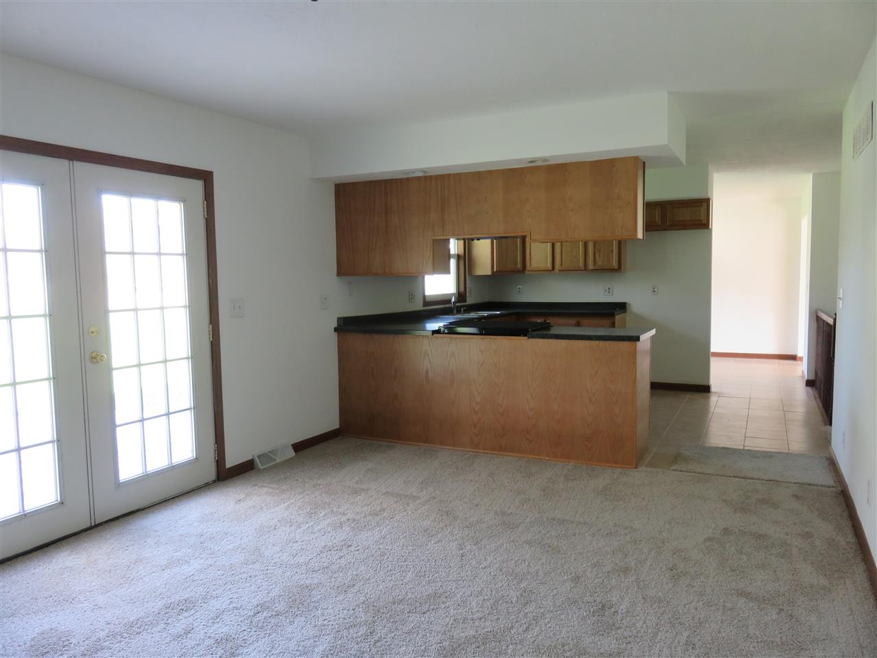 12140 Tresemer Road Roscoe, IL 61073 - Photo 8 of 17 a kitchen with a cabinets and appliances