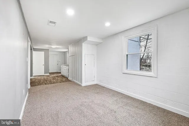 a view of livingroom with an empty space