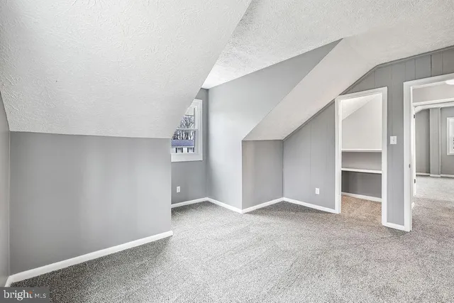 an empty room with closet