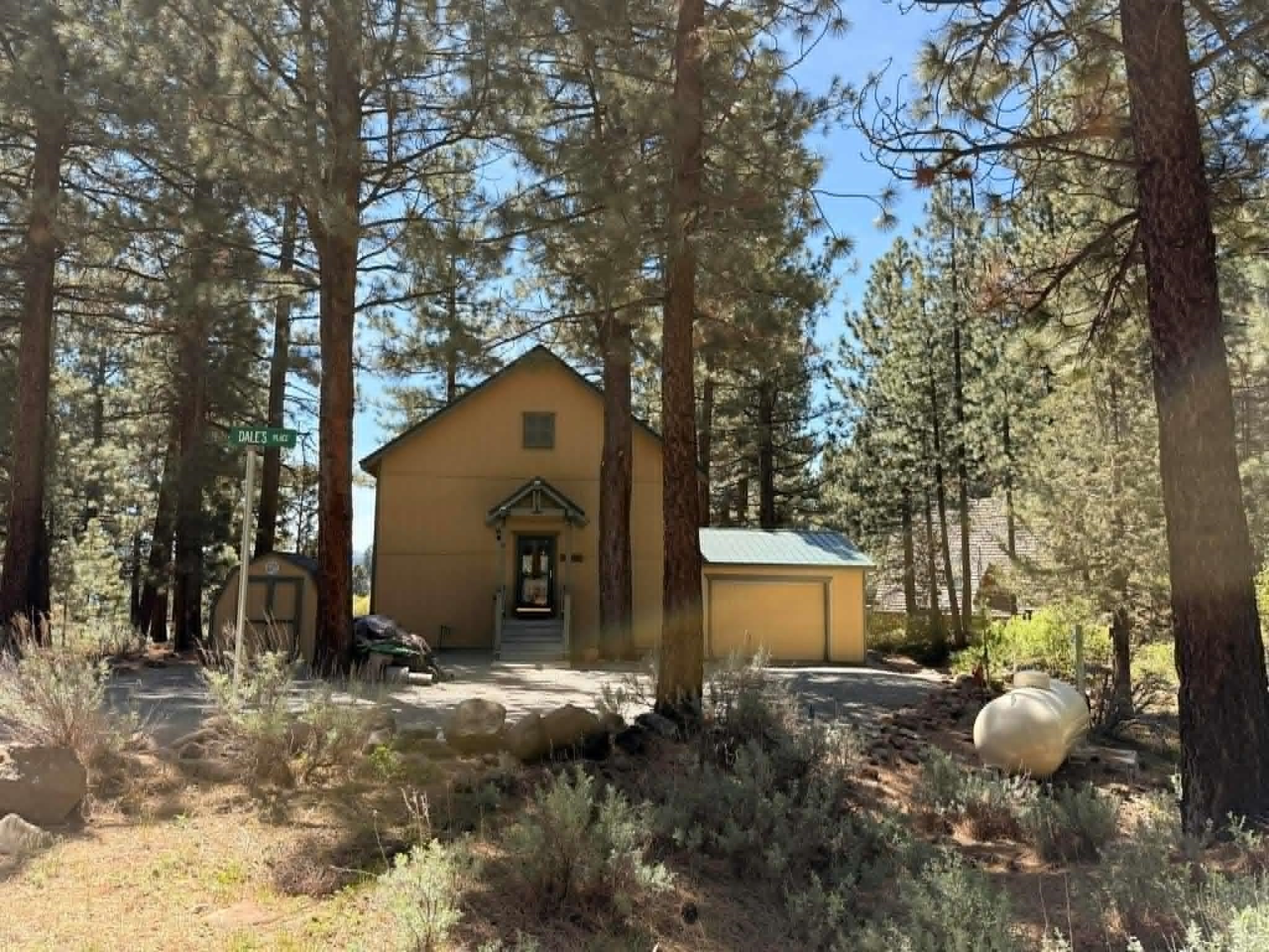 93 Juniper Road Beckwourth, CA 96129 - Photo 34 of 35 a view of a house with a backyard and trees