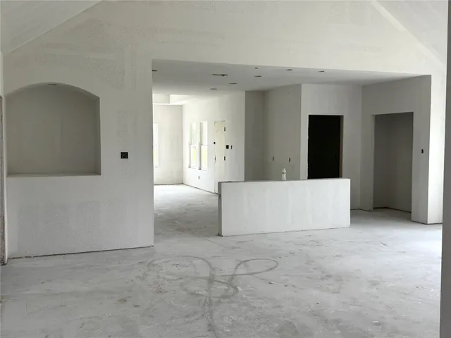 a view of a kitchen with a refrigerator