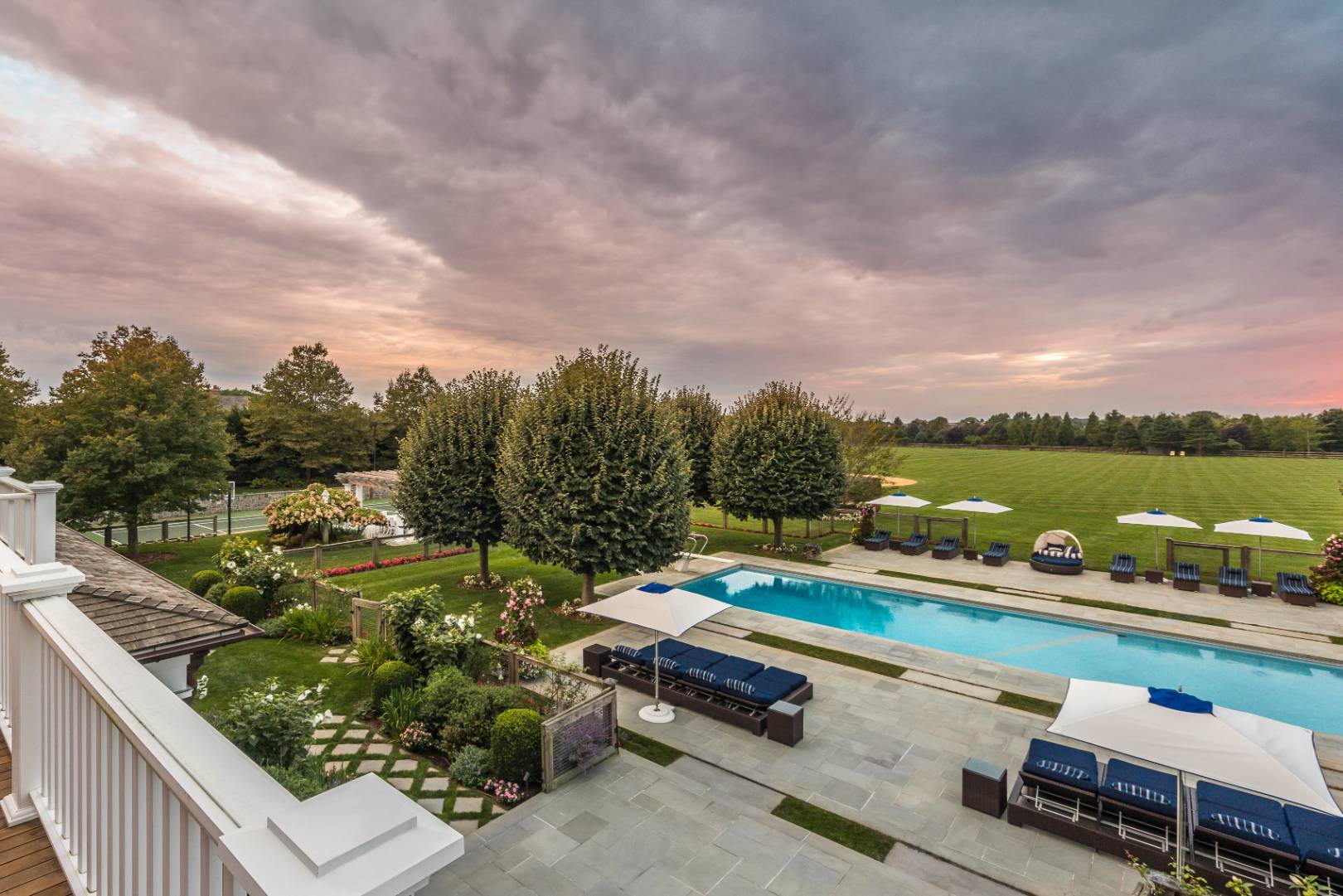 a terrace with outdoor seating and city view