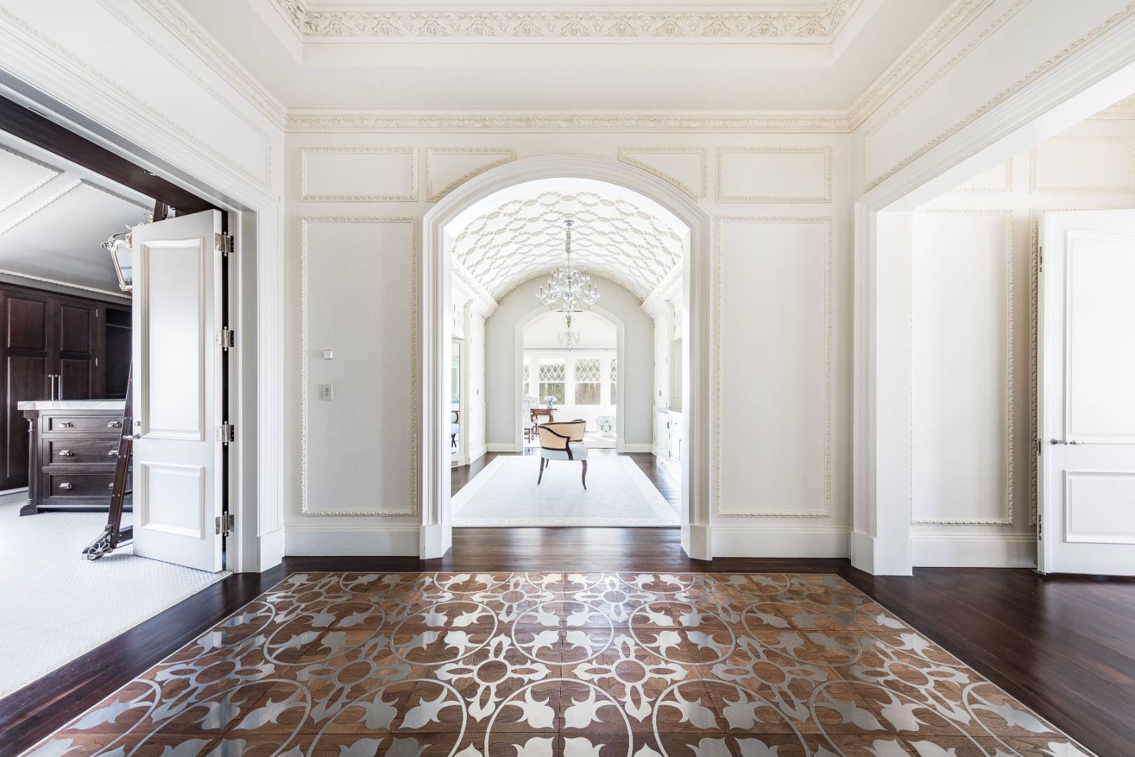 612 Halsey Lane Bridgehampton, NY 11932 - Photo 19 of 31 a view of a hallway with entryway and wooden floor