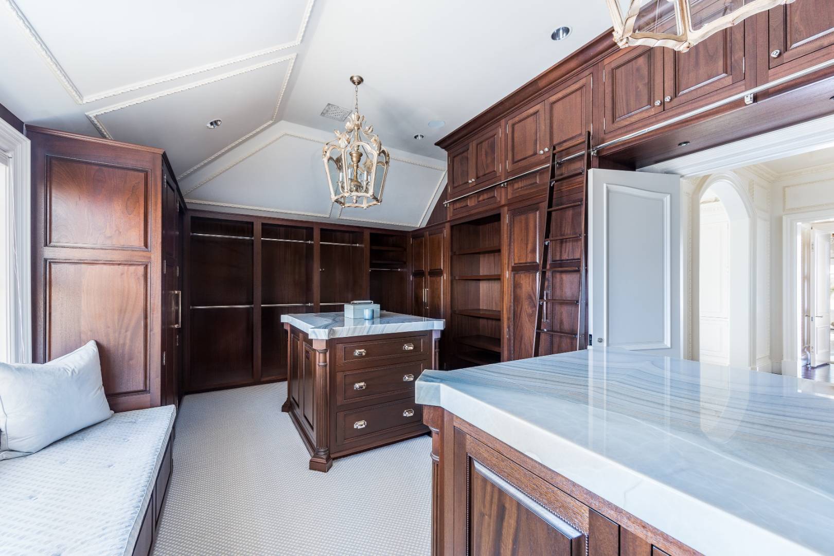 612 Halsey Lane Bridgehampton, NY 11932 - Photo 20 of 31 a kitchen with stainless steel appliances granite countertop a sink and a refrigerator