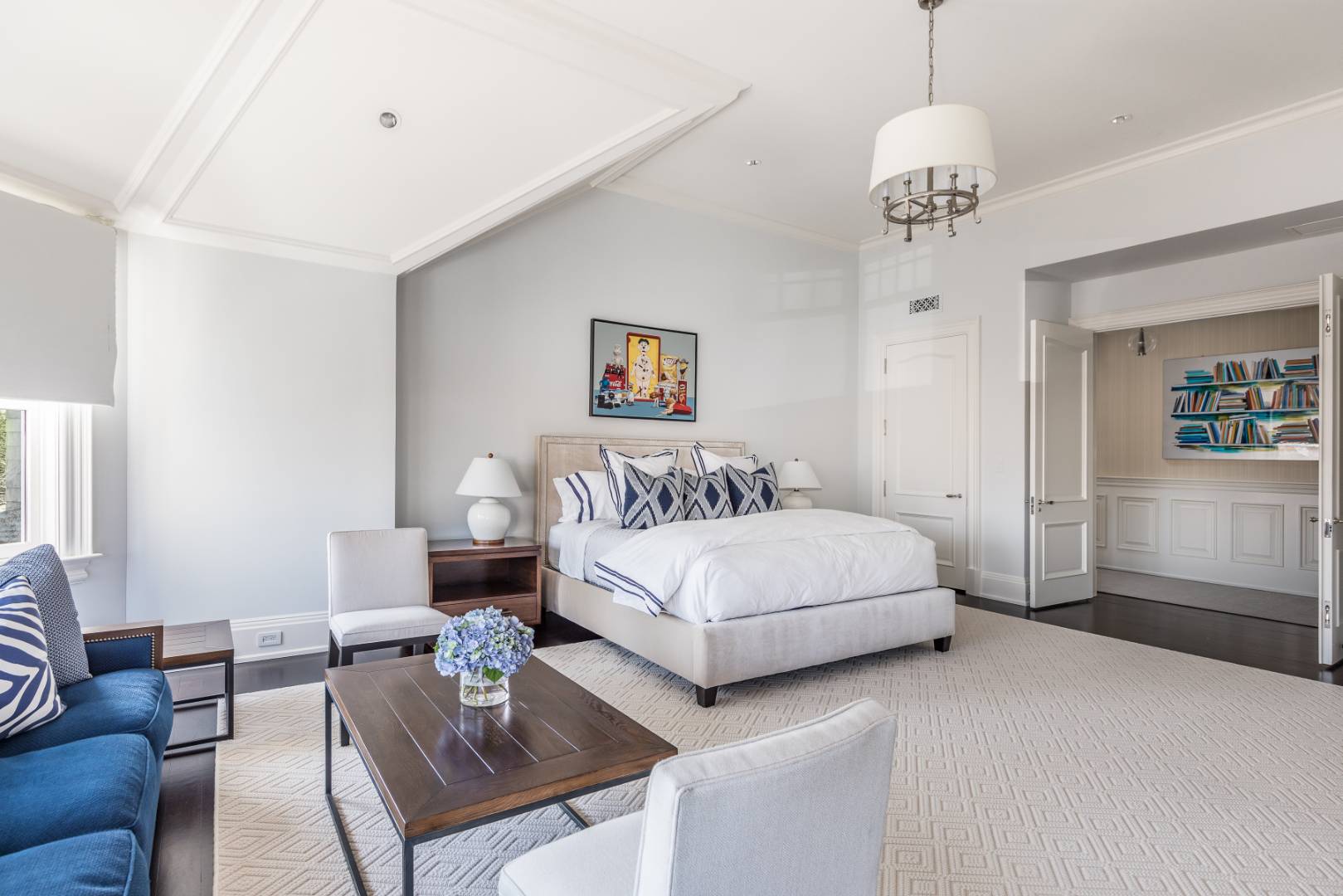 612 Halsey Lane Bridgehampton, NY 11932 - Photo 21 of 31 a spacious bedroom with a bed a couch and dresser