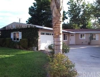 3472 Kenmill Street Riverside, CA 92504 - Photo 1 of 1 front view of a house with a yard
