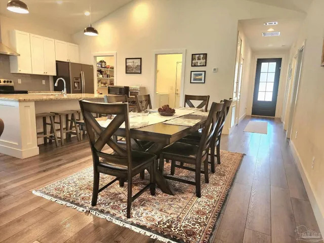 a view of a dining room with furniture