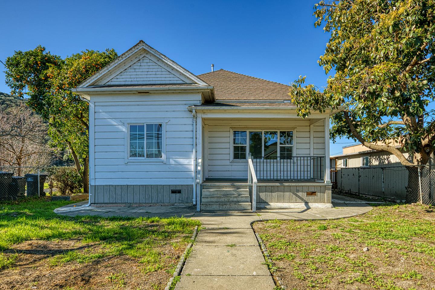 138 San Miguel Canyon Road Watsonville, CA 95076 - Photo 3 of 61 a front view of a house with a yard