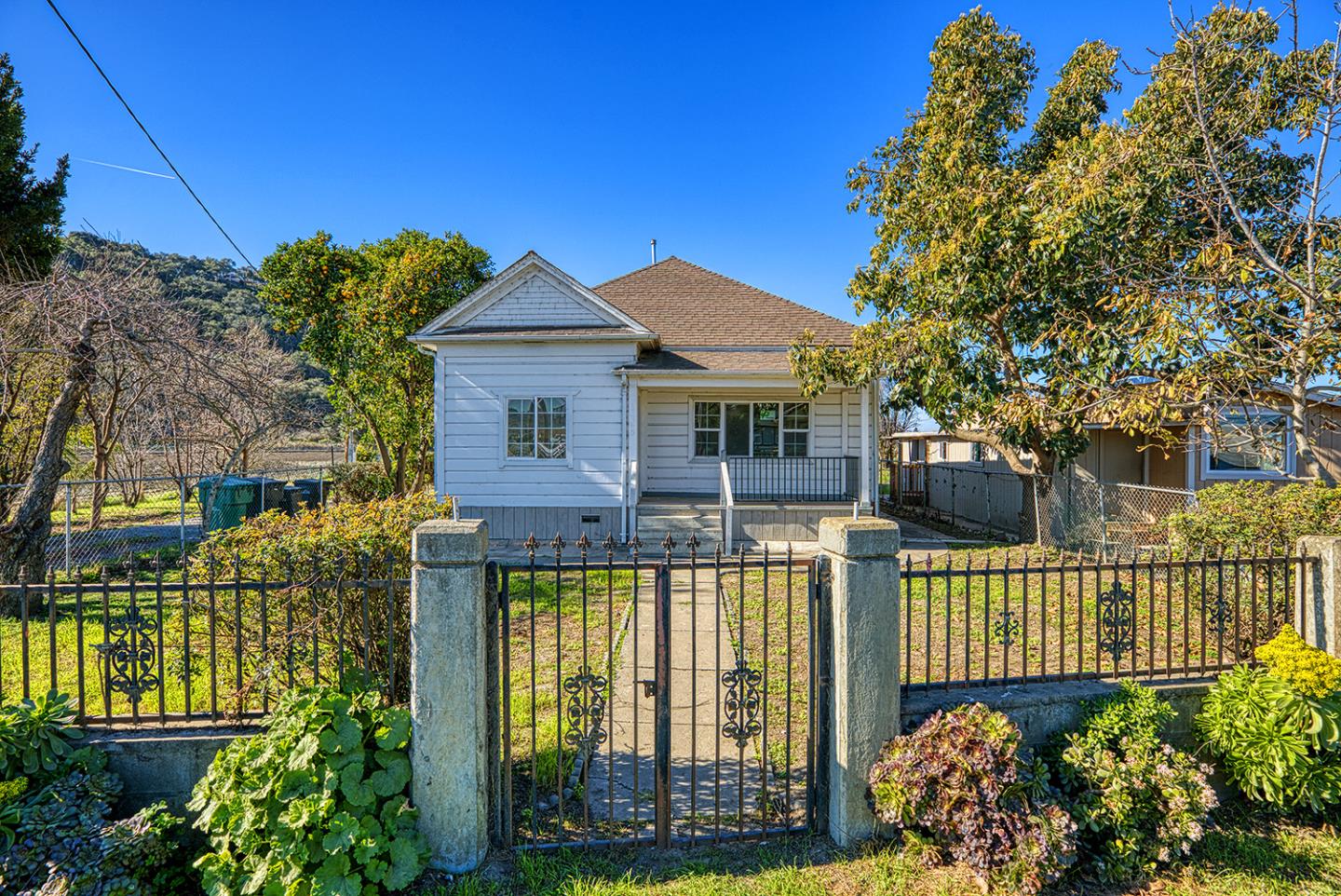 138 San Miguel Canyon Road Watsonville, CA 95076 - Photo 4 of 61 a house view with a garden space