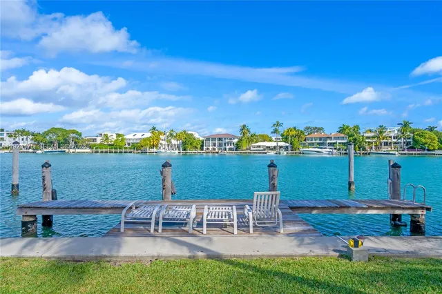 a view of a lake with a sitting space