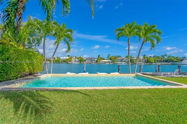a view of a yard with a table and chair