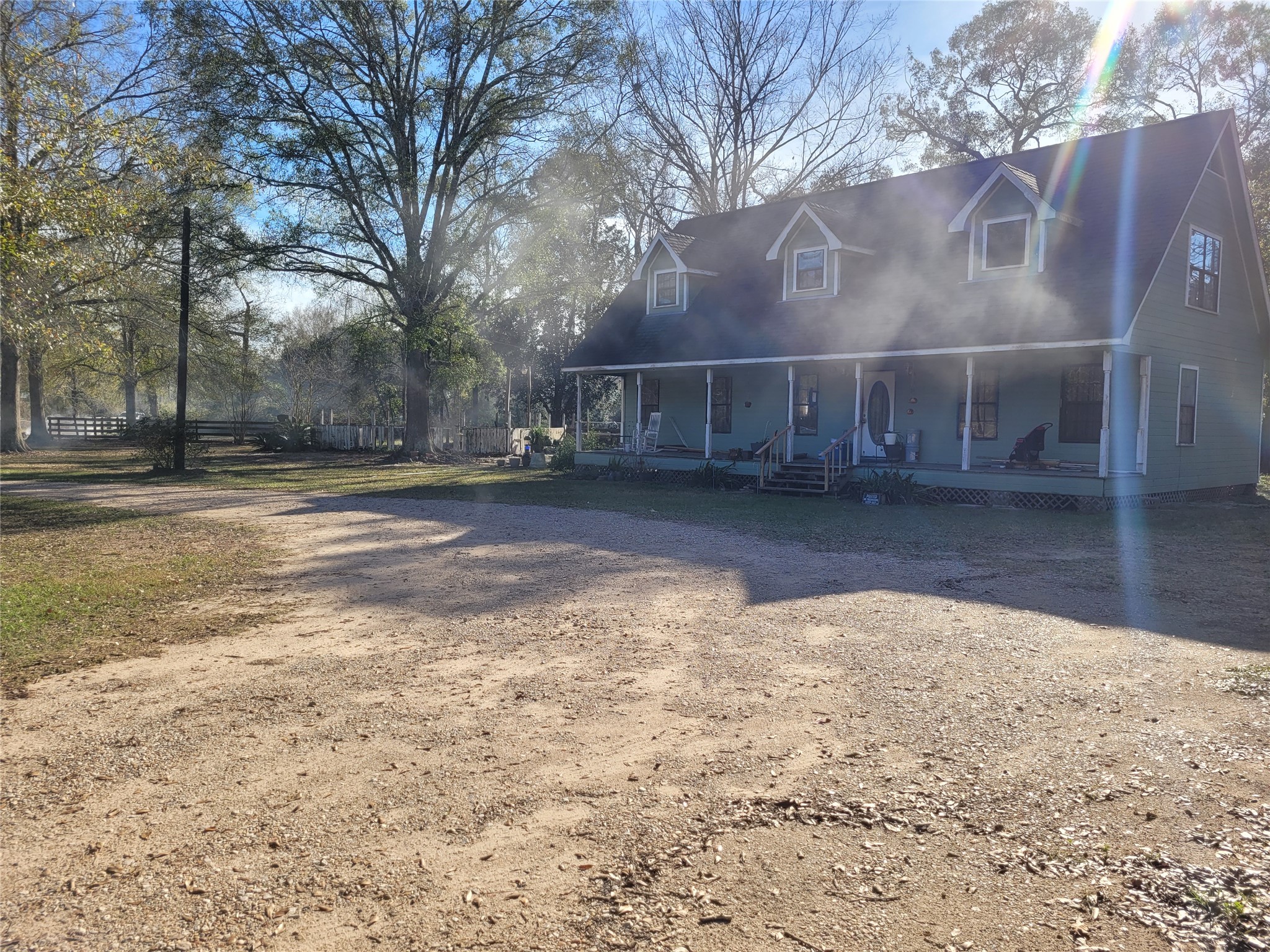 a view of a large yard with a house