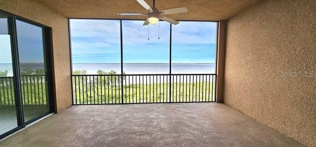 a view of a room has a window