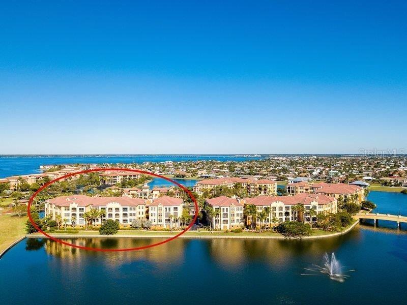 89 Vivante Boulevard, Unit 8942 Punta Gorda, FL 33950 - Photo 34 of 44 a view of a ocean with city