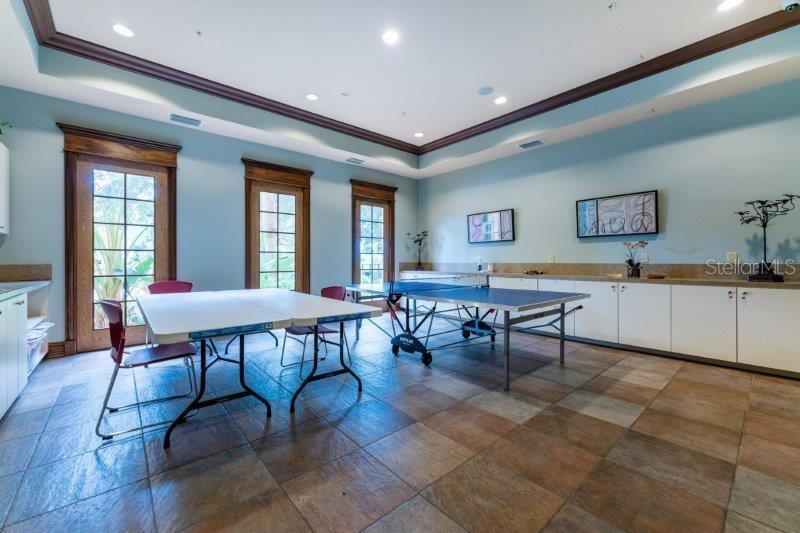 89 Vivante Boulevard, Unit 8942 Punta Gorda, FL 33950 - Photo 40 of 44 a view of a dining room with furniture and window