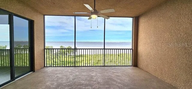 a view of a room has a window