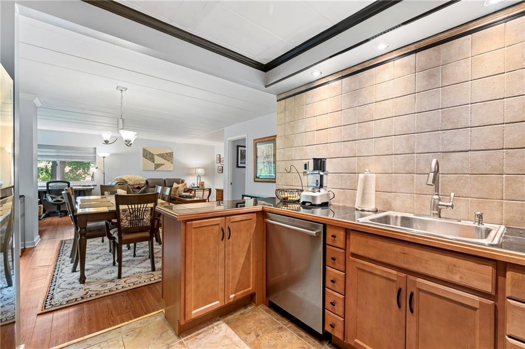 5 Bayard Road, Unit 203 Pittsburgh, PA 15213 - Photo 7 of 21 a kitchen with a sink appliances and cabinets