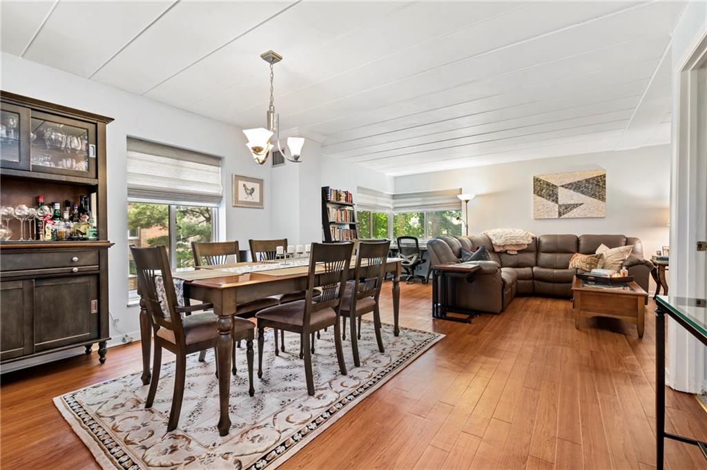 5 Bayard Road, Unit 203 Pittsburgh, PA 15213 - Photo 8 of 21 a view of a dining room with furniture window and wooden floor
