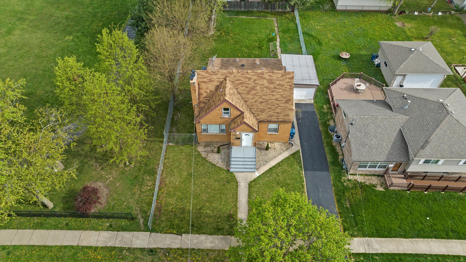 3846 149th Street Midlothian, IL 60445 - Photo 7 of 13 an aerial view of a house with a yard