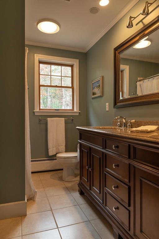70 Birch Hill Road Northampton, MA 01062 - Photo 17 of 30 a bathroom with a sink and a mirror