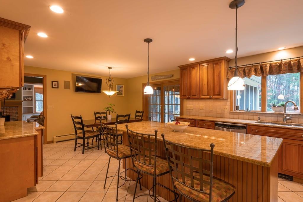 70 Birch Hill Road Northampton, MA 01062 - Photo 4 of 30 a dinning area with furniture and a chandelier