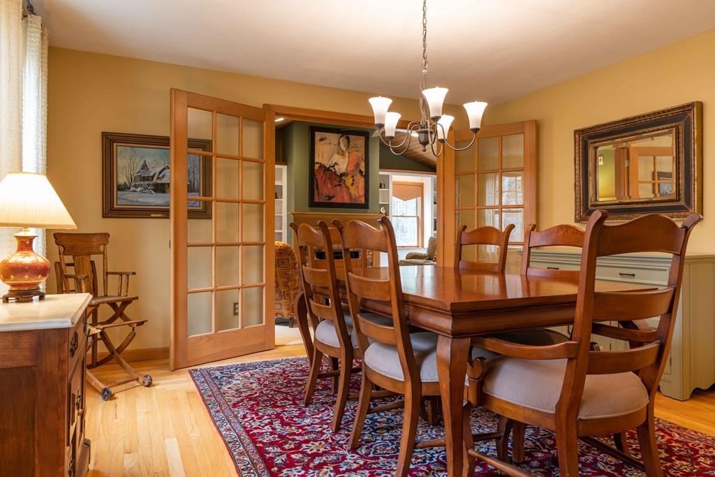 70 Birch Hill Road Northampton, MA 01062 - Photo 7 of 30 a dining room with furniture and chandelier