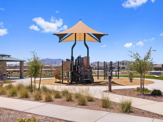a view of a yard with a patio