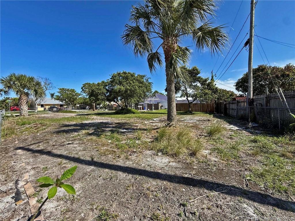 5152 Southeast Primrose Way Stuart, FL 34997 - Photo 7 of 13 a view of a yard with an outdoor space