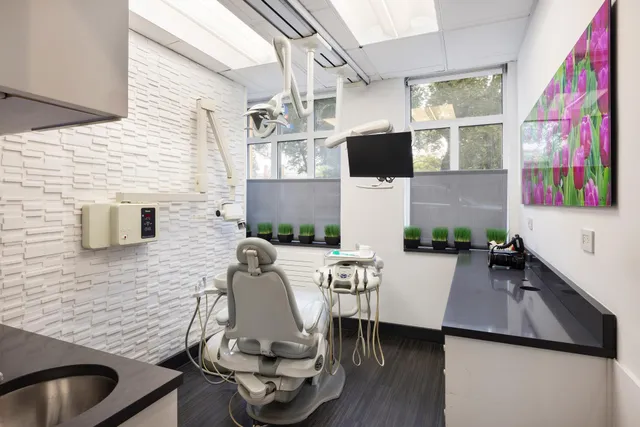 a living room with furniture and flat screen tv