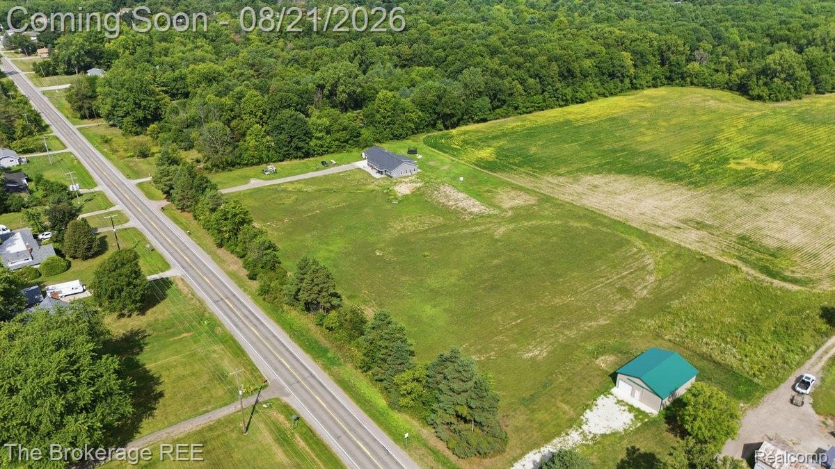 9161 East Coldwater Road Davison, MI 48423 - Photo 48 of 52 Extensive property with a detached building and a separate structure featuring a green roof