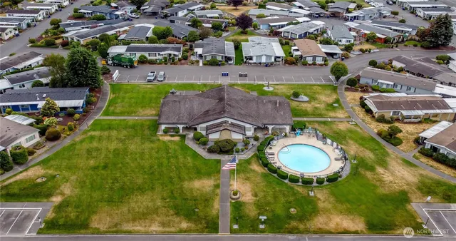 a view of a house with a swimming pool