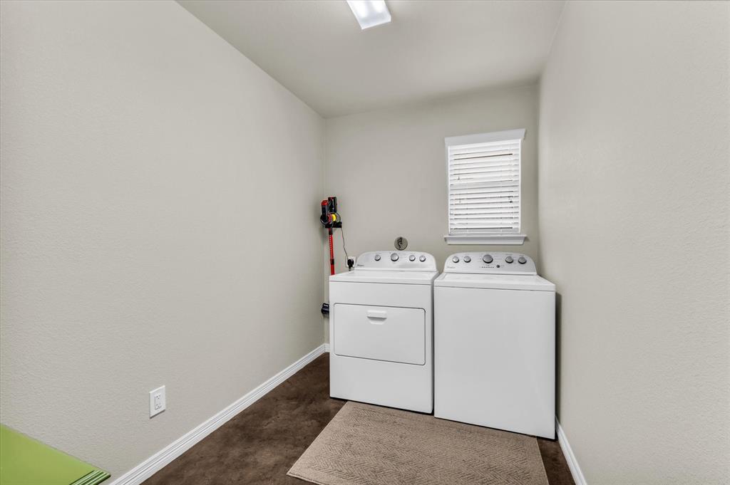 814 Springdale Circle Lorena, TX 76655 - Photo 24 of 37 Dedicated laundry room featuring light-toned walls, wood-finish flooring, a window with blinds, and white baseboards
