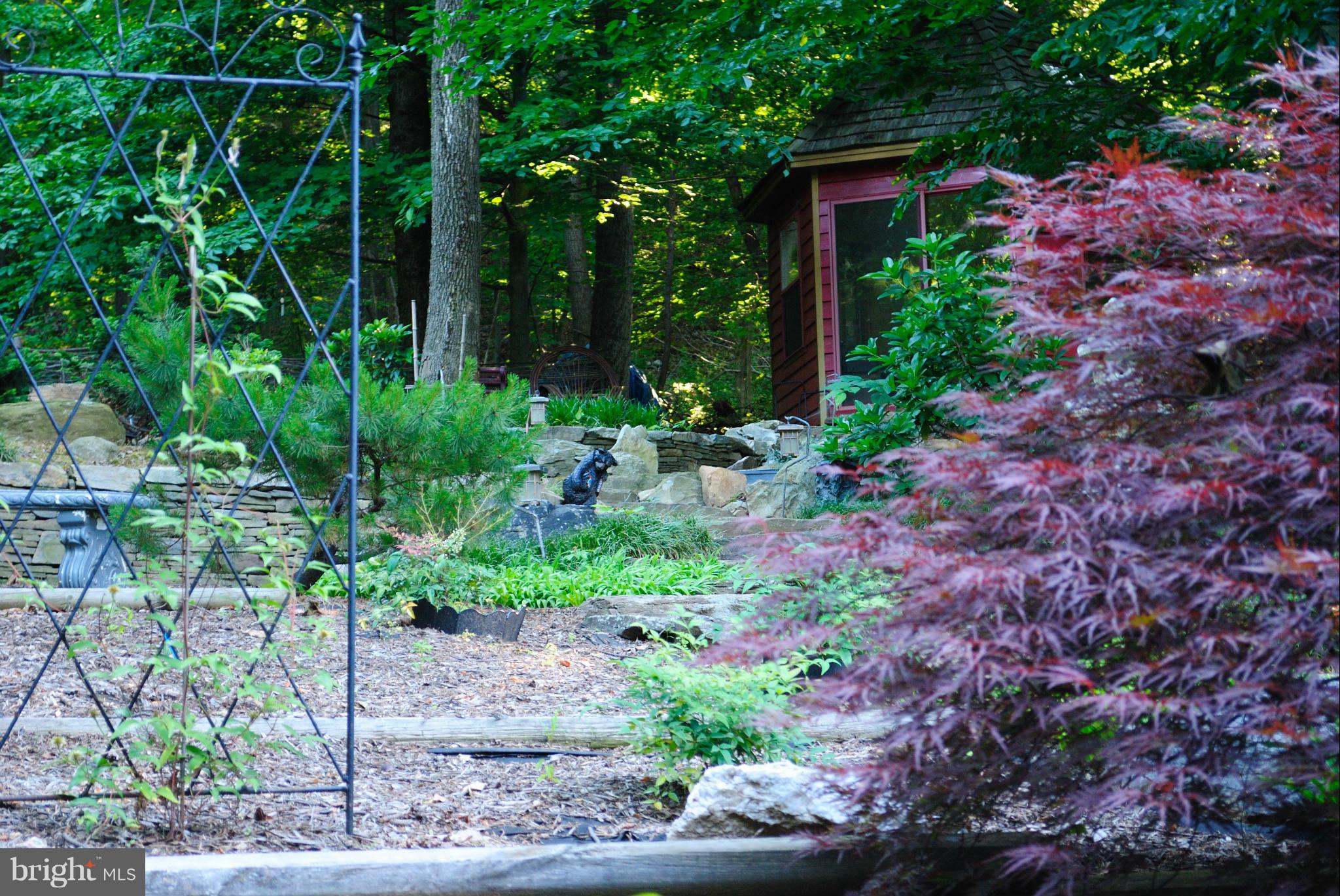 3880 Point Of Rocks Road Jefferson, MD 21755 - Photo 24 of 30 a garden with lots of plants and trees
